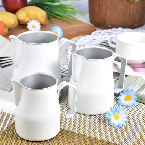 https://www.baristaspace.com/cdn/shop/products/Stainless-Steel-Milk-Frothing-Pitcher-Jug-Espresso-For-Coffee-Moka-Cappuccino-Latte-Drinks-Barista-Craft-350_2_large.jpg?v=1520518724